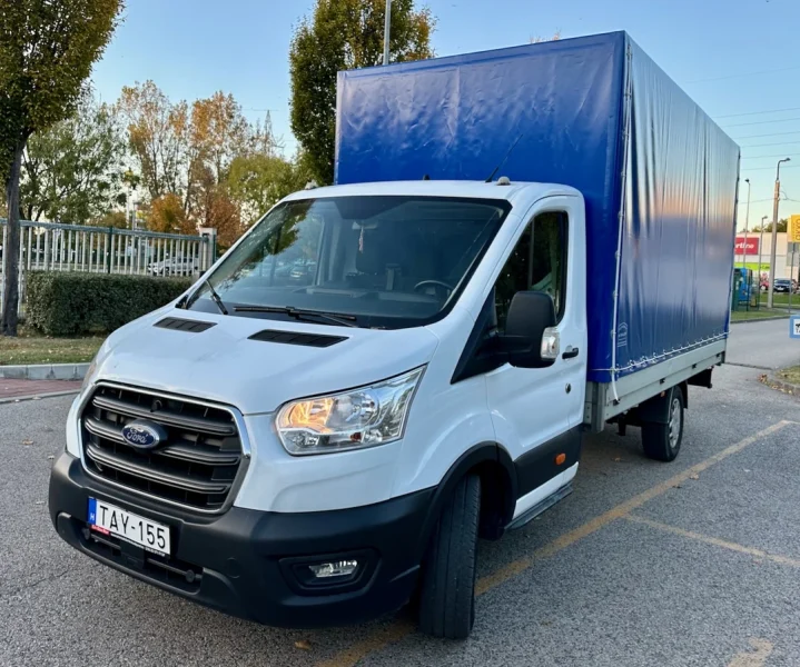 Platós-ponyvás Ford Transit bérlés vonóhoroggal Budapesten